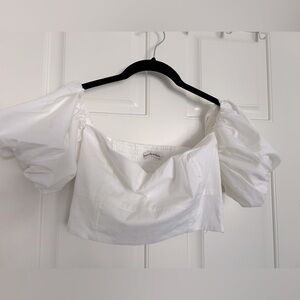 Cute European vacation top for jeans or skirts.